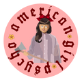 A circular graphic featuring a stylized illustration of a girl with dark hair, a red bow, and a pale lavender shirt holding a gray axe. The text 'american girl psycho' is written in dark red stylized lettering around the circle, with small yellow flowers on a light pink background.